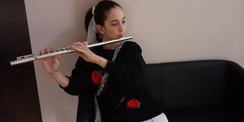 Evelīna Erliha.
