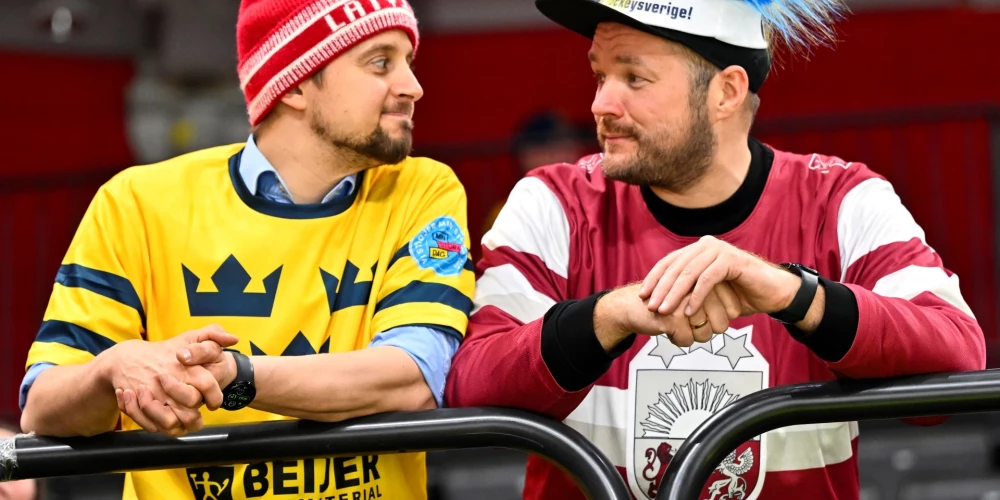 Pēc pirmā perioda labāks noskaņojums ir Latvijas līdzjutējiem (foto: Scanpix / EPA)