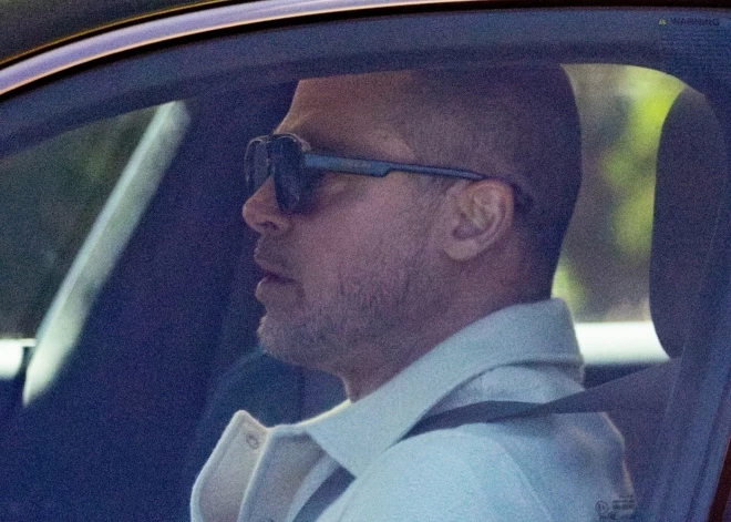 Брэда Питта сняли папарацци за рулем машины - он стал практически лысым