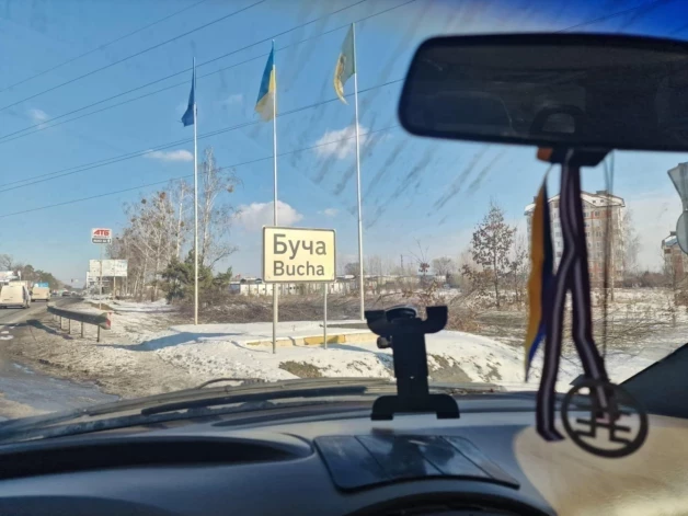 В Буче, где российские войска совершали страшные преступления.