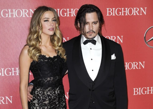 Džonijs Deps un Ambera Hērda 2016. gadā.