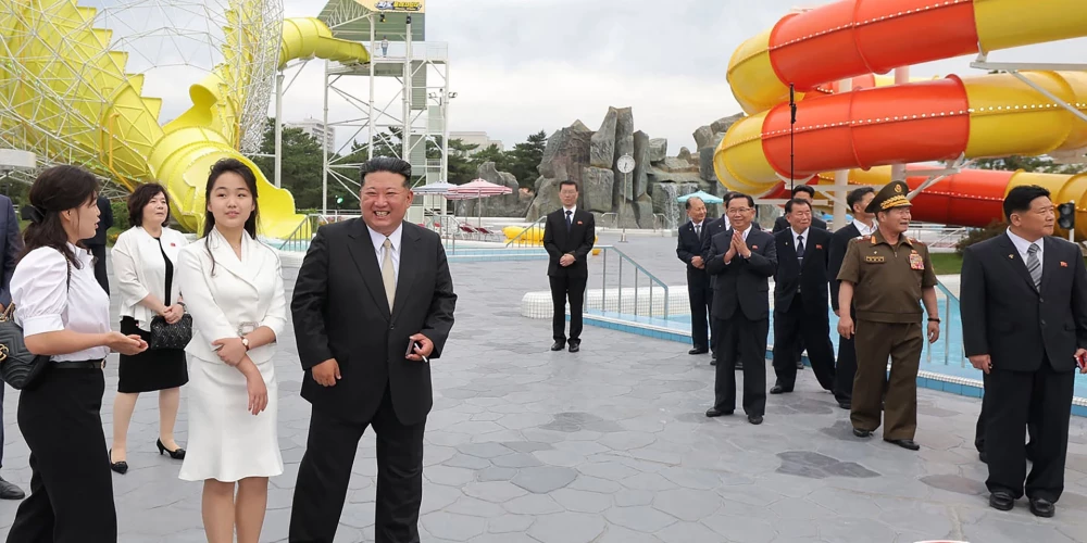 This picture taken on June 24, 2025 and released by North Korea's official Korean Central News Agency (KCNA) on June 26, 2025 shows North Korean leader Kim Jong Un (centre L), his daughter Kim Ju Ae (3rd L), and his wife Ri Sol Ju (L) visiting the Wonsan Kalma coastal tourist area in Kangwon Province, North Korea. North Korea opened a massive resort area on its east coast, state media said on July 2, with the tourism pet project of leader Kim Jong Un reportedly set to welcome Russian guests later this month.
Dubbed "North Korea's Waikiki" by South Korean media, the Wonsan Kalma Coastal Tourist Area can accommodate nearly 20,000 people, according to Pyongyang, which previously described it as "a world-class cultural resort". (Photo by KCNA VIA KNS / AFP) / South Korea OUT / ---EDITORS NOTE--- RESTRICTED TO EDITORIAL USE - MANDATORY CREDIT "AFP PHOTO/KCNA VIA KNS" - NO MARKETING NO ADVERTISING CAMPAIGNS - DISTRIBUTED AS A SERVICE TO CLIENTS
THIS PICTURE WAS MADE AVAILABLE BY A THIRD PARTY. AFP CAN NOT INDEPENDENTLY VERIFY THE AUTHENTICITY, LOCATION, DATE AND CONTENT OF THIS IMAGE. /