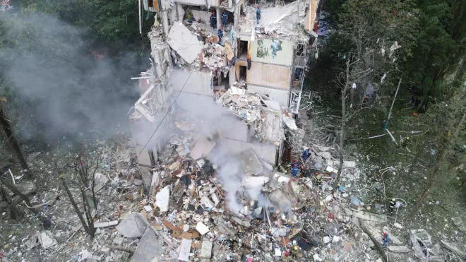 Разрушенный россиянами дом в Киеве.