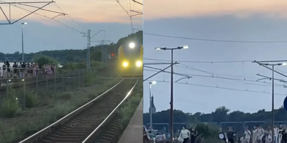 Люди увидели электричку и принялись бежать на другой перрон.