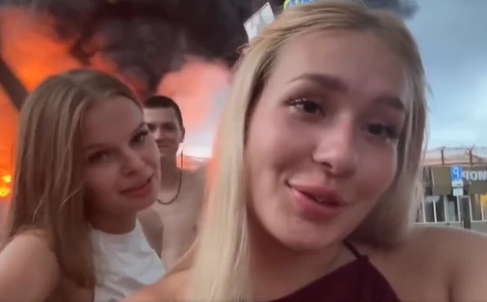 VIDEO: jaunietei, kura uzjautrinājās uz Sočos degošās naftas bāzes fona, piespriests 30 000 rubļu sods