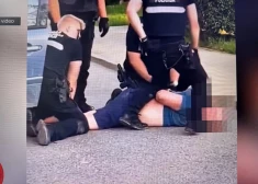 "Не отдам!" В Болдерае полицейским пришлось силой вытаскивать упертого мужчину из авто, которое подлежало эвакуации