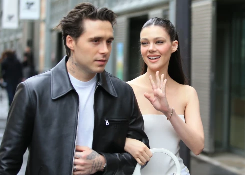 Bruklins Bekhems ar sievu Nikolu Pelcu.