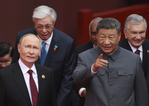 Vladimirs Putins un Sji Dzjiņpins Ķīnā.