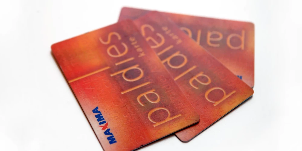 Карточка Maxima.