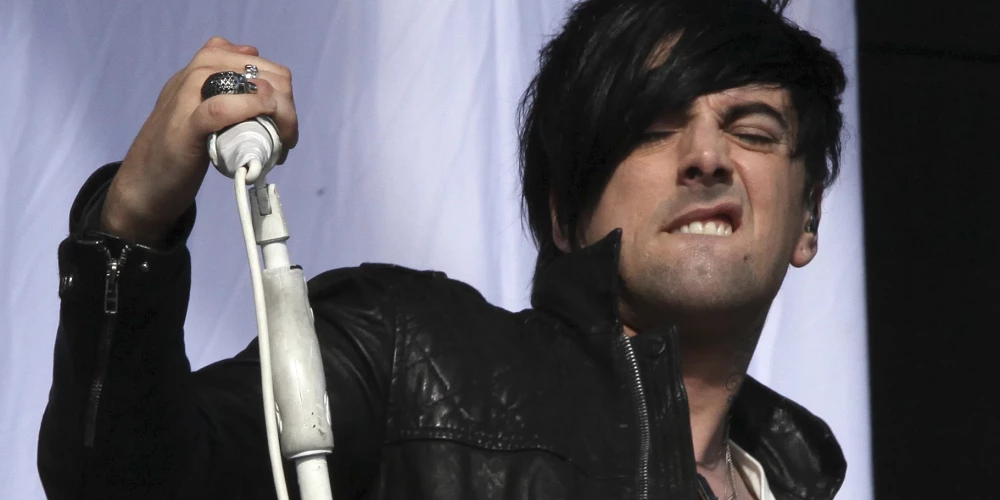 "Lostprophets" līderis Īens Votkinss koncerta laikā 2011. gadā
