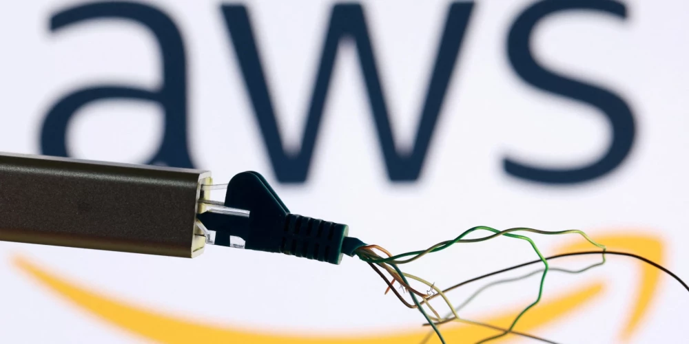 AWS logo and broken ethernet cable are seen in this illustration taken October 20, 2025. REUTERS/Dado Ruvic/Illustration