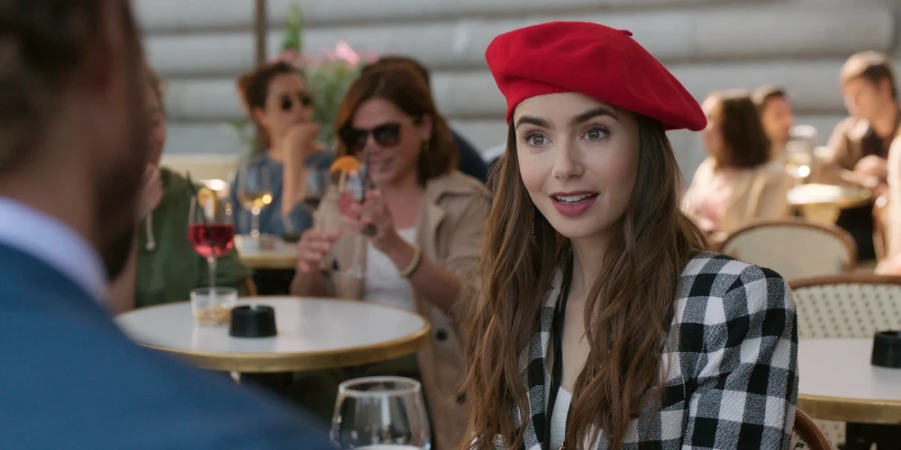 Lily Collins as Emily Cooper