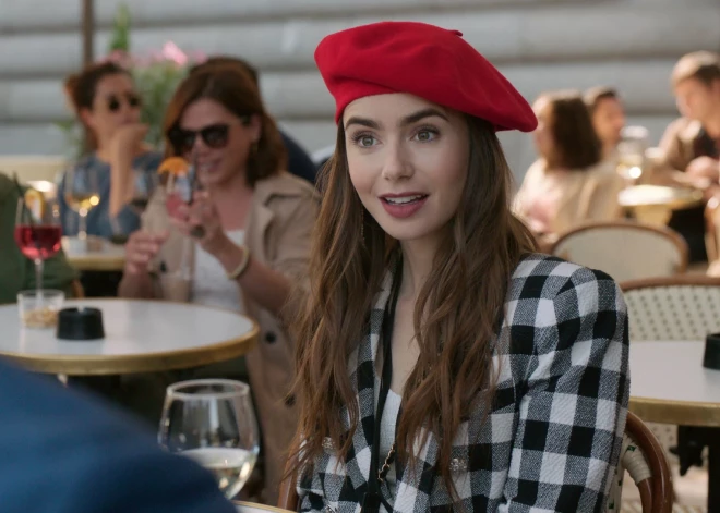 Lily Collins as Emily Cooper