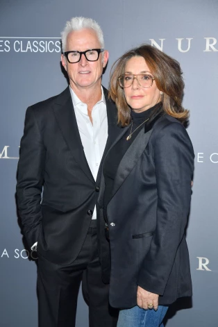 Talija ar savu vīru Džonu.