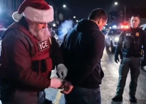 Mūsdienās ASV Ziemassvētku vecītis pilda arī šādas funkcijas (ekrānuzņēmums no video)