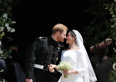 Princis Harijs un Megana Mārkla kāzu dienā.