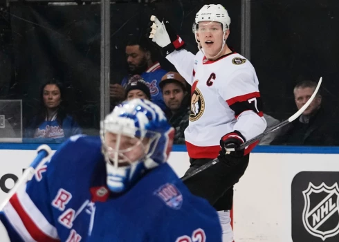 Breidijs Tkačaks priecājas par Džonatana Kvika pārspēšanu.