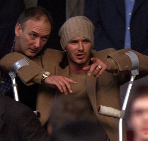 Deivids ar tēvu 2002. gadā.