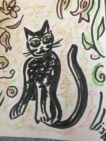 Savā brīvajā laikā viņai patīk zīmēt. Zīmējumā redzams filmas "Straume" kaķis.