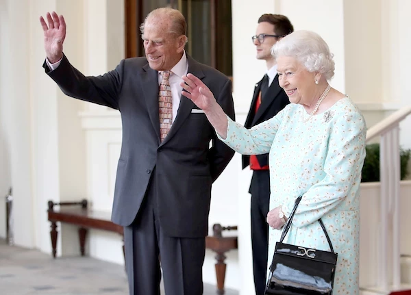 Королева Елизавета II и принц Филипп.