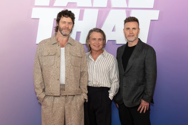 Hovards Donalds, Marks Ouvens un Garijs Bārlovs dokumentālās filmas pirmizrādes vakarā šā gada 26. janvārī Londonā.