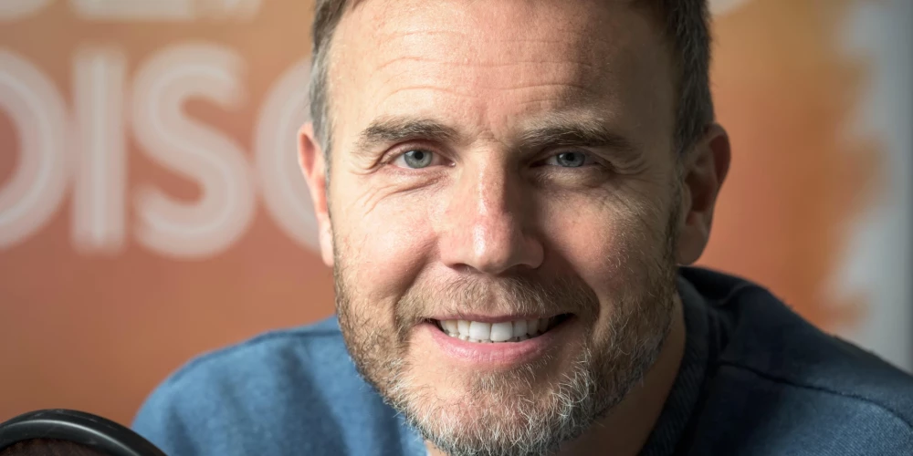 Grupas “Take That” dziedātājs Garijs Bārlovs.