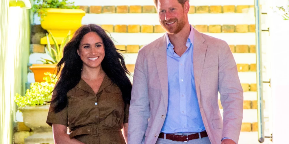 Megana Mārkla un princis Harijs.