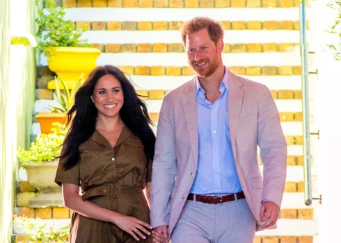 Megana Mārkla un princis Harijs.