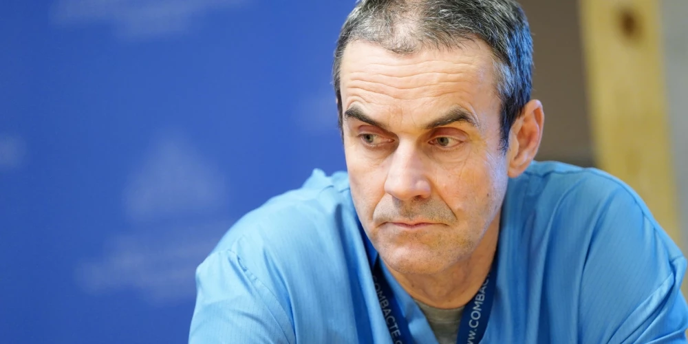 Профессор Уга Думпис.