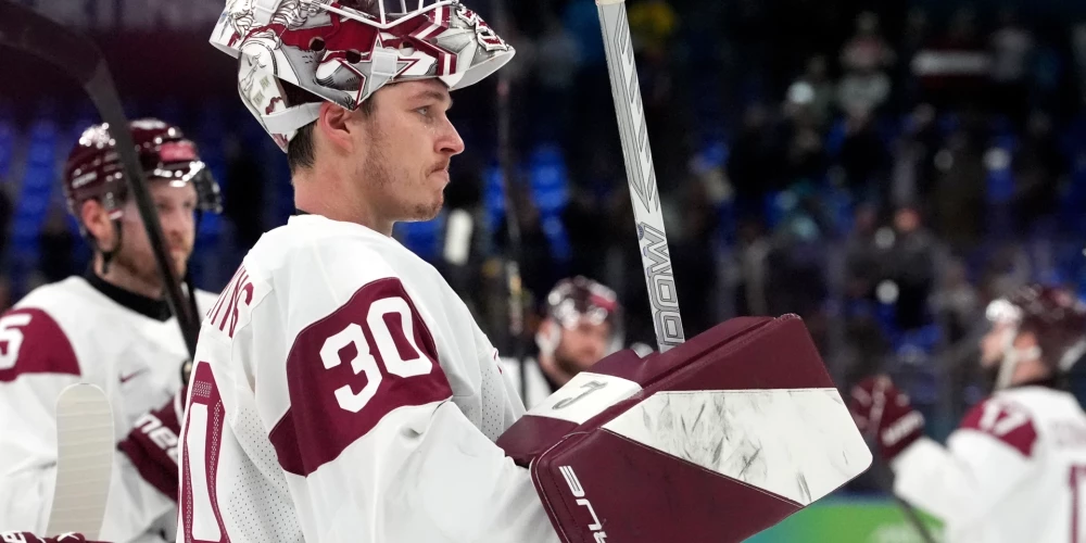 Latvijas hokeja izlases vārtsargs  Elvis Merzļikins.