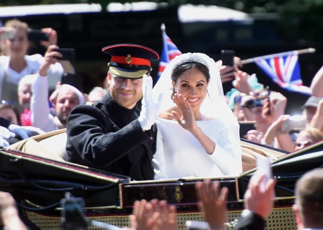 Решение Меган Маркл на свадьбе, которое ранило королеву Елизавету и навсегда изменило королевский протокол