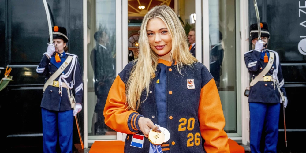 Juta Lērdama ar izcīnītajām medaļām.