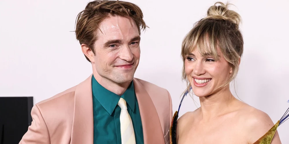 Roberts Patinsons ar dzīvesbiedri Suki Voterhausu.