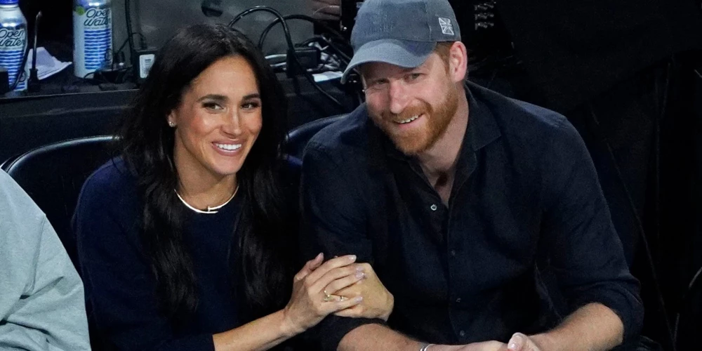 Megana Mārkla un princis Harijs.