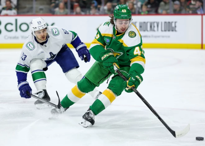 Bļugeram rezultatīva piespēle "Canucks" zaudējumā "Wild" komandai