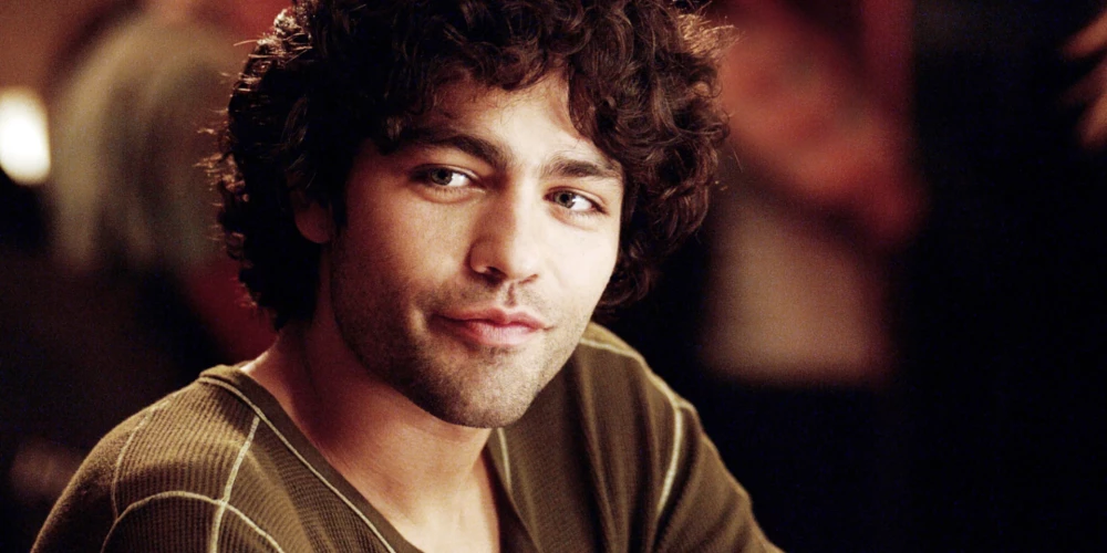 Adrians Grenjē filmā "Sātans Pradas brunčos".