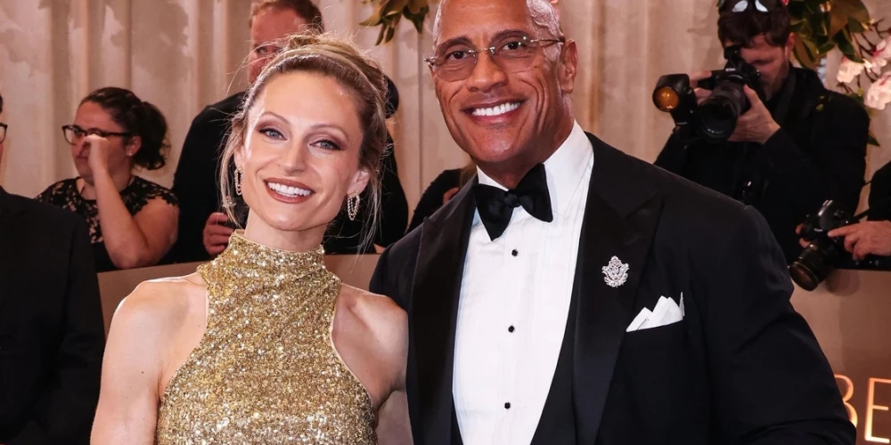 Dveins Džonsons ar sievu Lorēnu Hašianu.