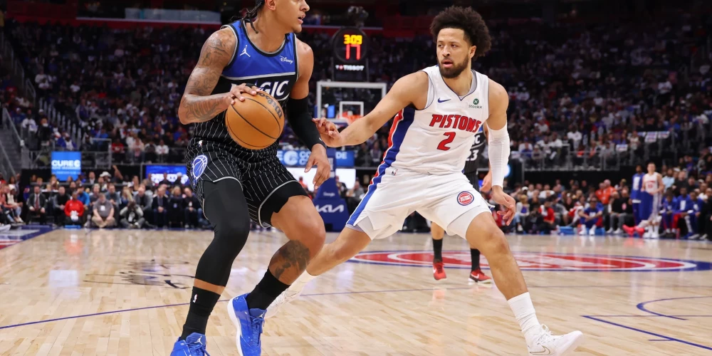 Paolo Bankero uzbrukumā pret Keidu Kaningemu.