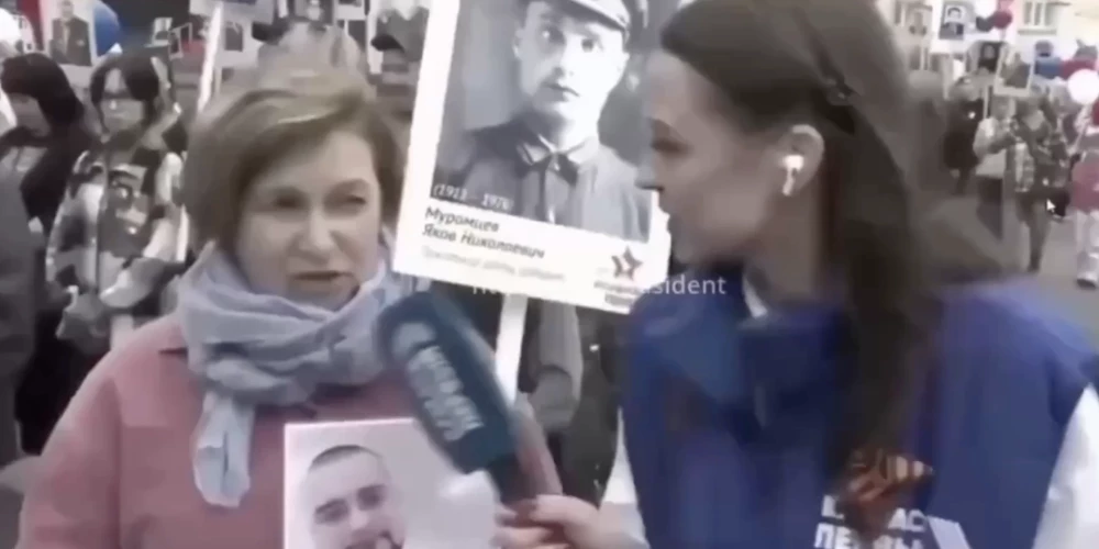 Žurnāliste apsveic māti, kas karā zaudējusi savu dēlu, dubultos svētkos.